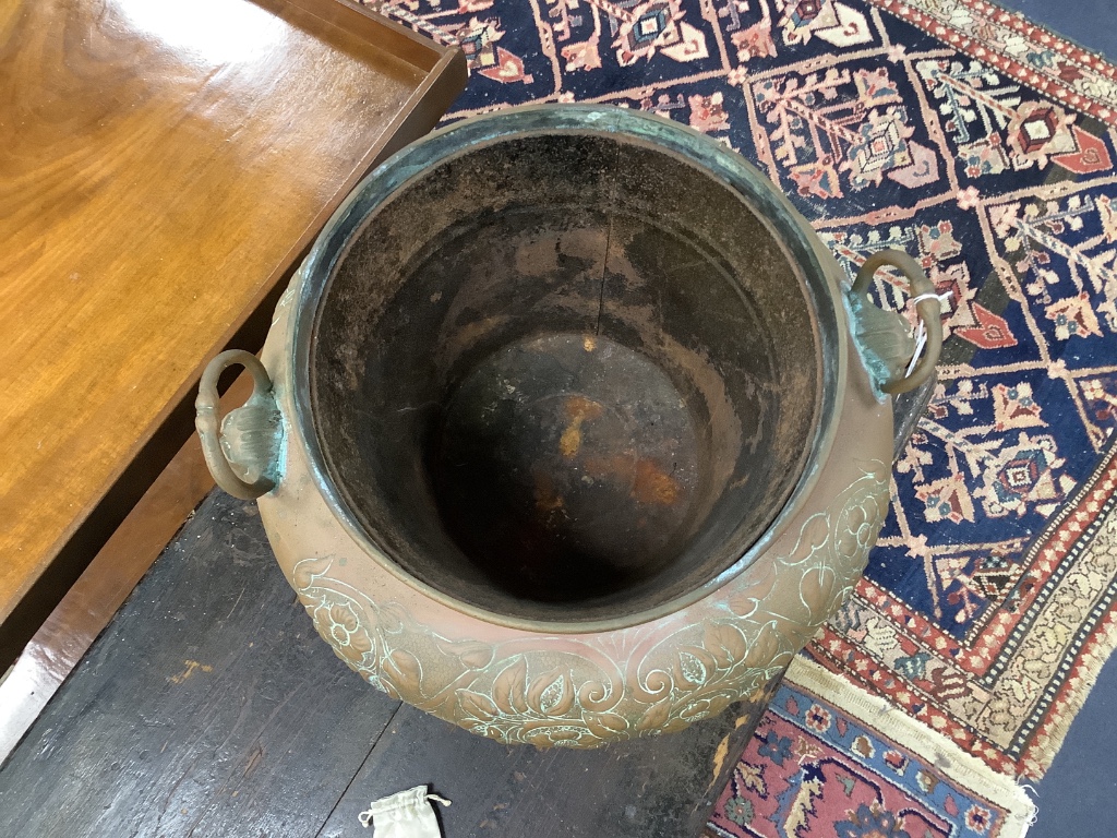 A late 19th century embossed brass jardiniere, height 36cm